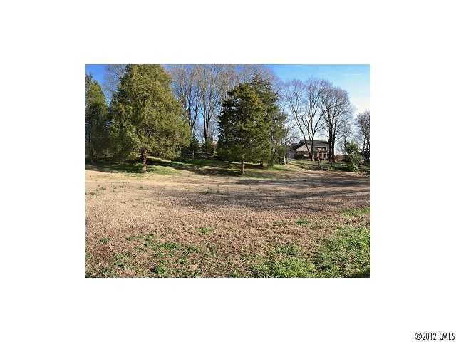 4443 Carmel Road Charlotte, NC 28226 - Photo 15 of 16 a view of a yard in front of a house