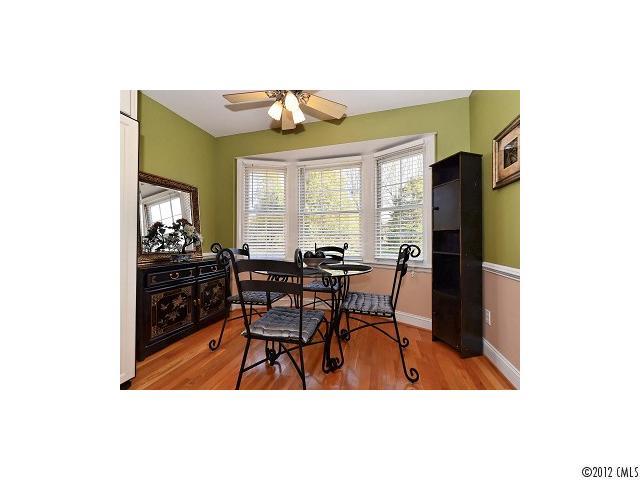 4443 Carmel Road Charlotte, NC 28226 - Photo 7 of 16 a view of a dining room with furniture and a window