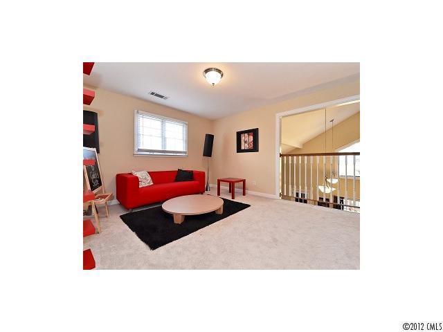 4443 Carmel Road Charlotte, NC 28226 - Photo 10 of 16 a living room with furniture and window