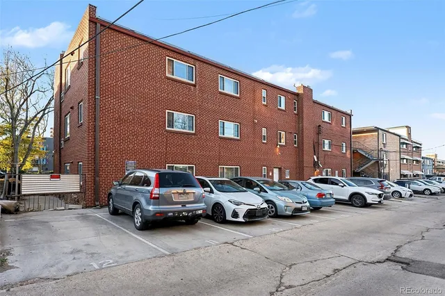 a car parked in front of a building