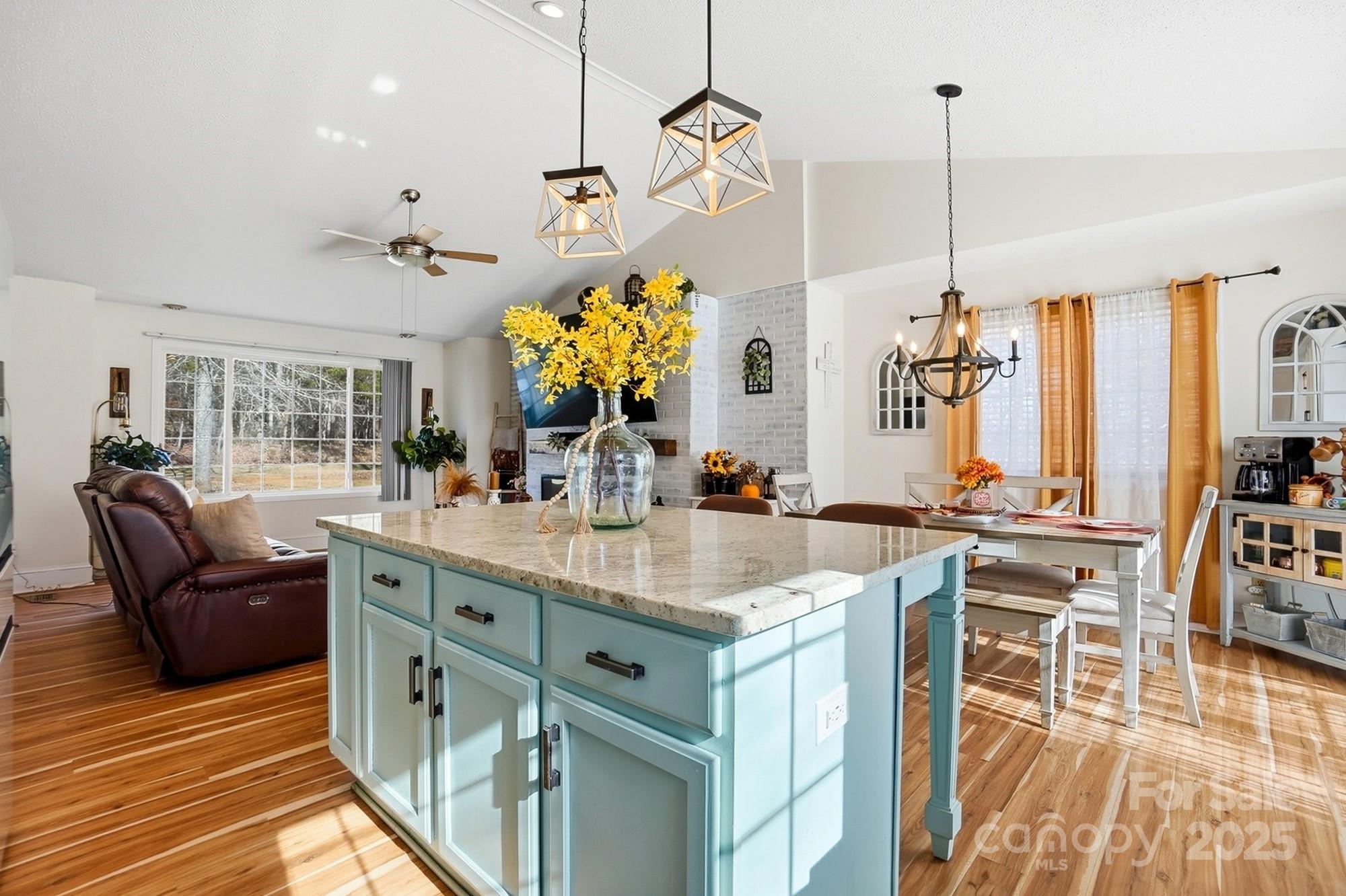 2012 Bethlehem Road Kings Mountain, NC 28086 - Photo 11 of 45 a living room with stainless steel appliances kitchen island granite countertop furniture and a view of living room