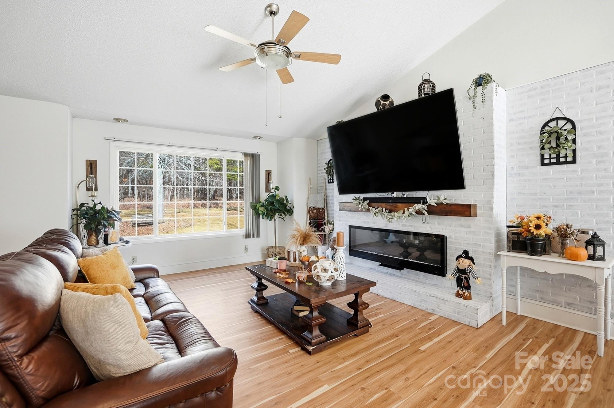 2012 Bethlehem Road Kings Mountain, NC 28086 - Photo 15 of 45 a living room with furniture and a flat screen tv