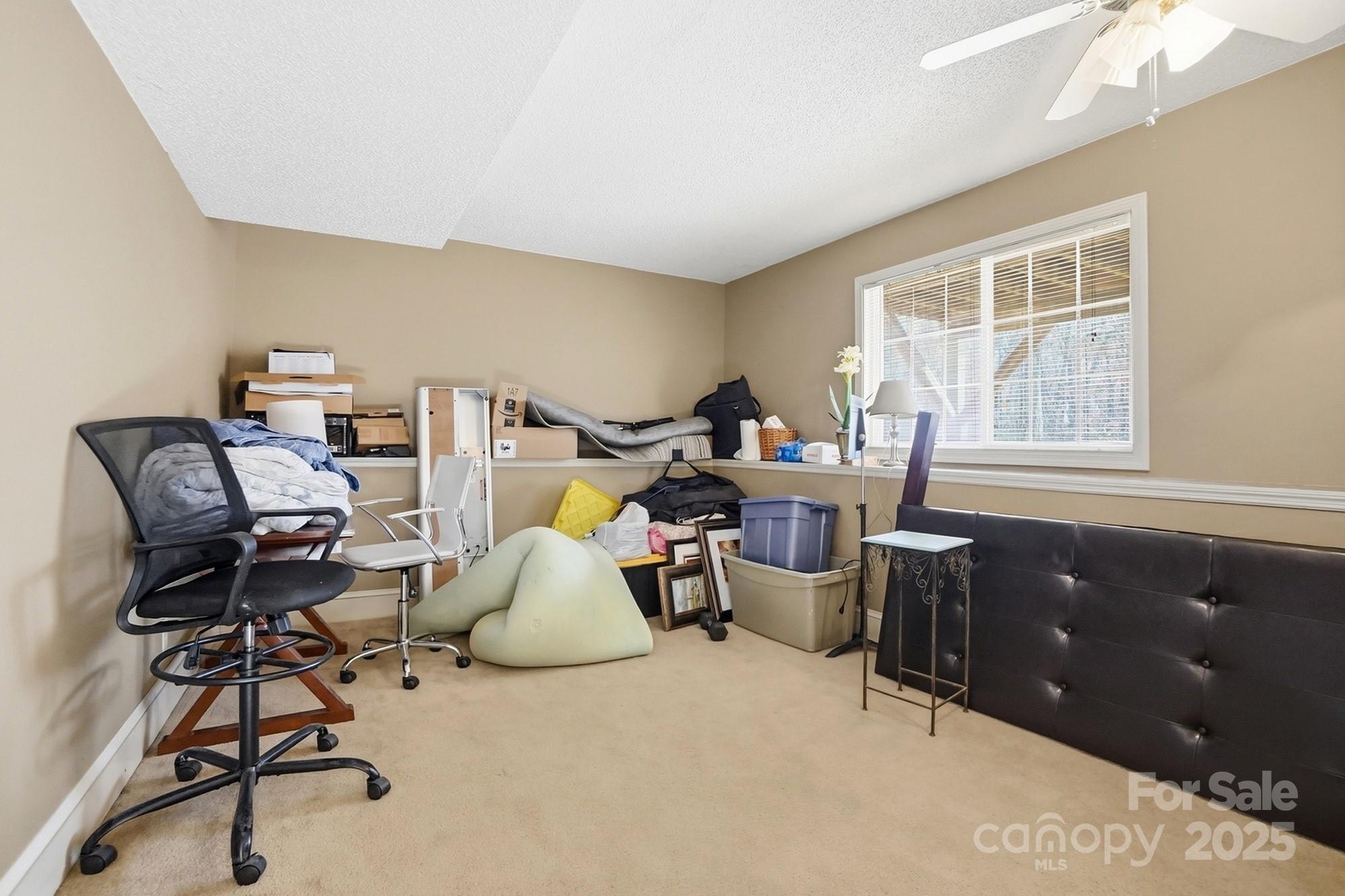 2012 Bethlehem Road Kings Mountain, NC 28086 - Photo 31 of 45 a view of a workspace with furniture and a window
