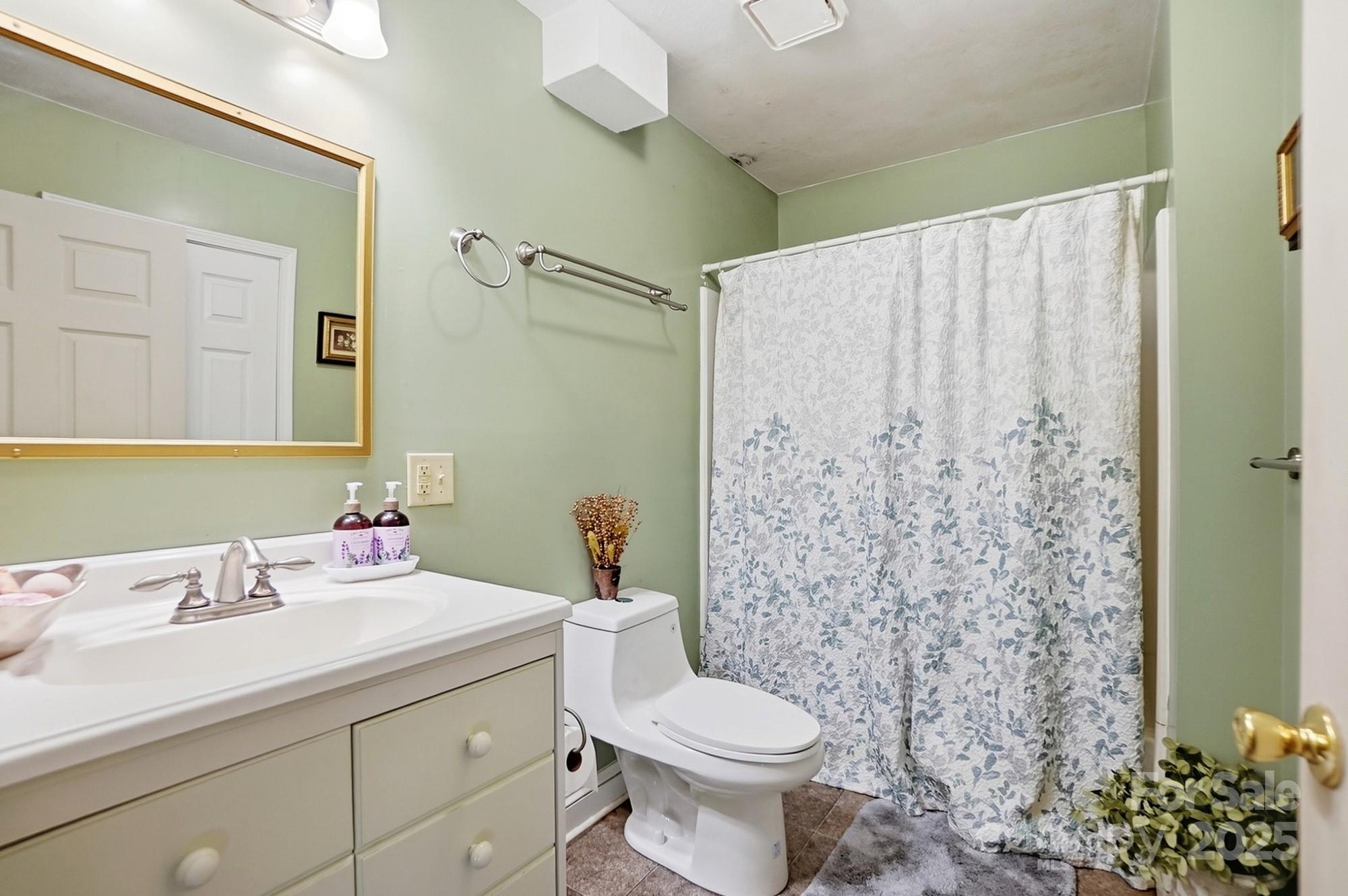 2012 Bethlehem Road Kings Mountain, NC 28086 - Photo 32 of 45 a bathroom with a sink toilet and shower