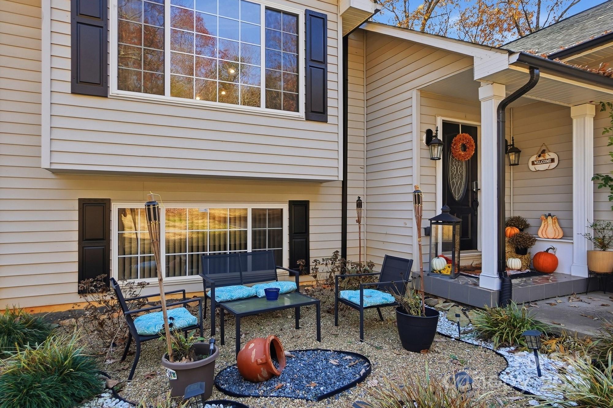 2012 Bethlehem Road Kings Mountain, NC 28086 - Photo 5 of 45 a view of a patio with a chairs and table in a patio