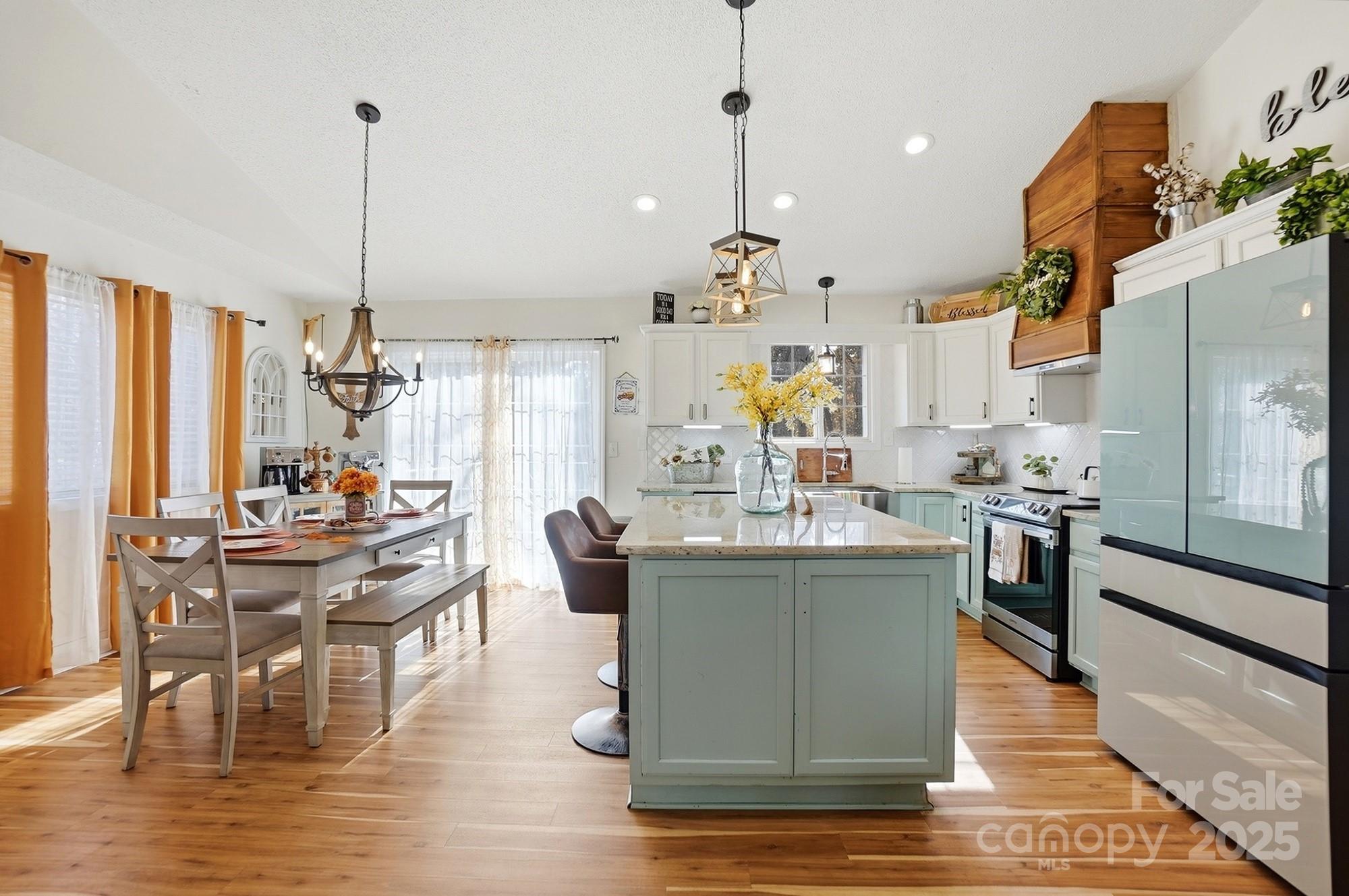 2012 Bethlehem Road Kings Mountain, NC 28086 - Photo 10 of 45 a dining table chairs wooden floor and kitchen view