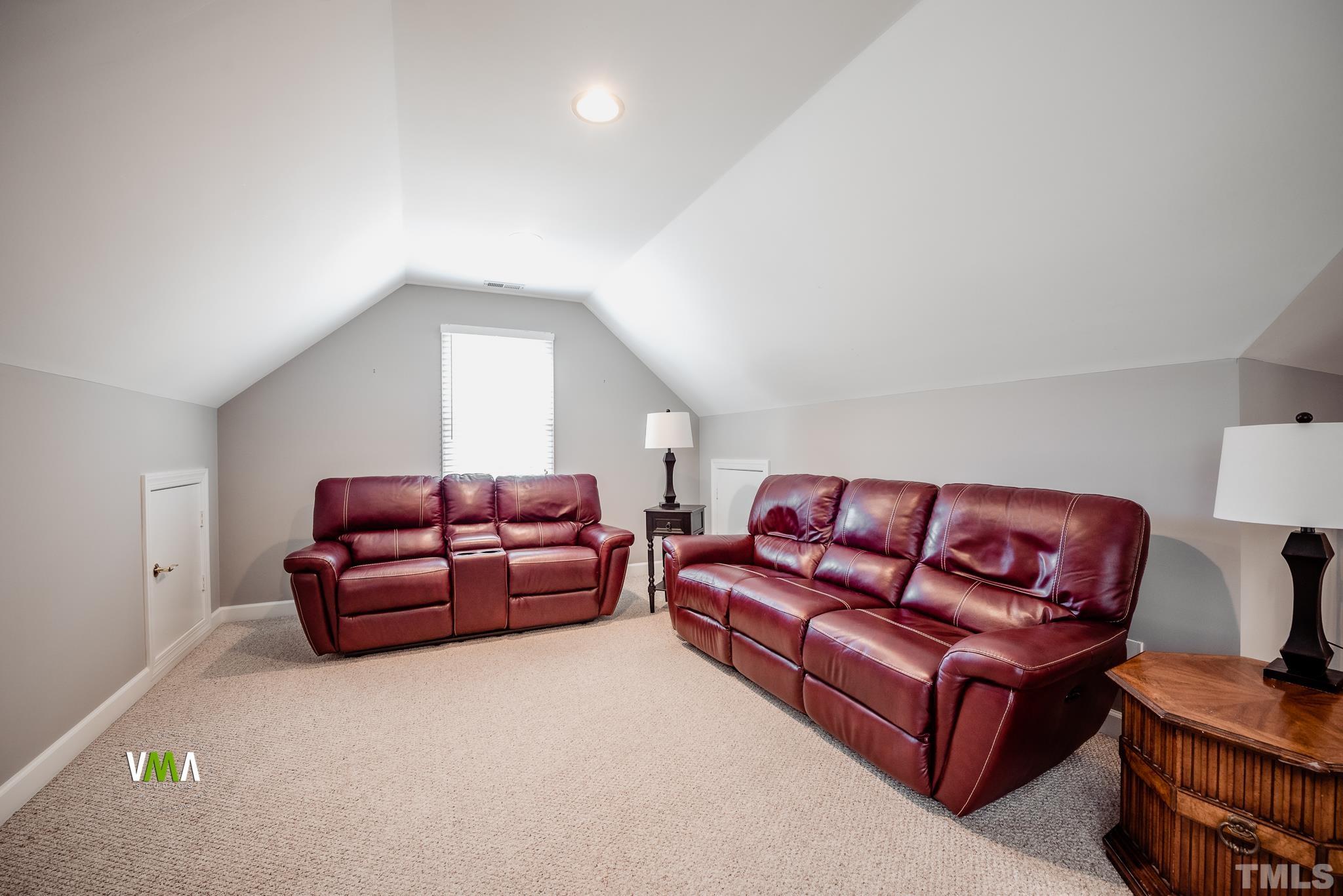 5417 Levering Mill Road Apex, NC 27539 - Photo 32 of 39 a living room with furniture