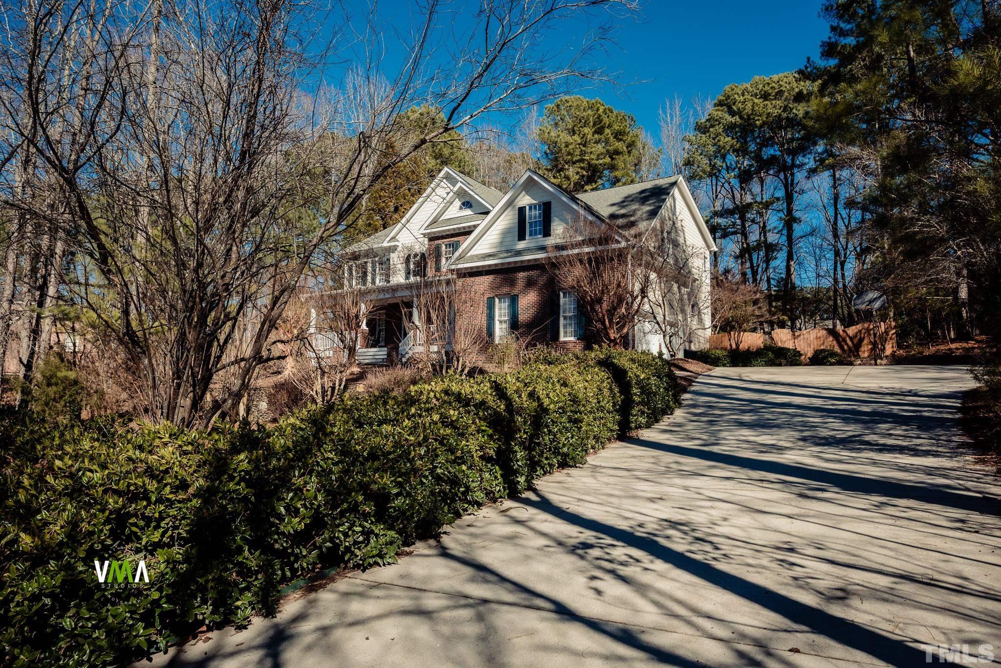 5417 Levering Mill Road Apex, NC 27539 - Photo 6 of 39 a view of a house with a yard
