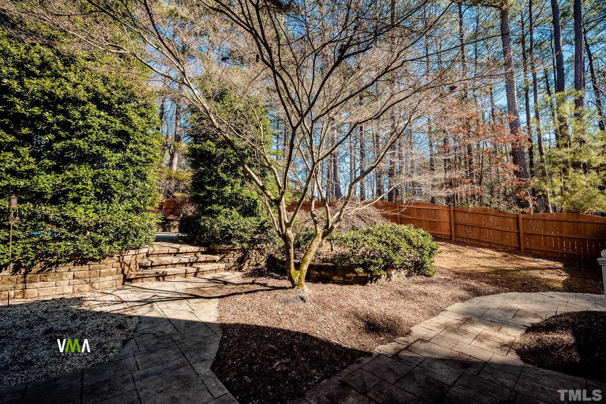 5417 Levering Mill Road Apex, NC 27539 - Photo 10 of 39 a view of a park with large trees