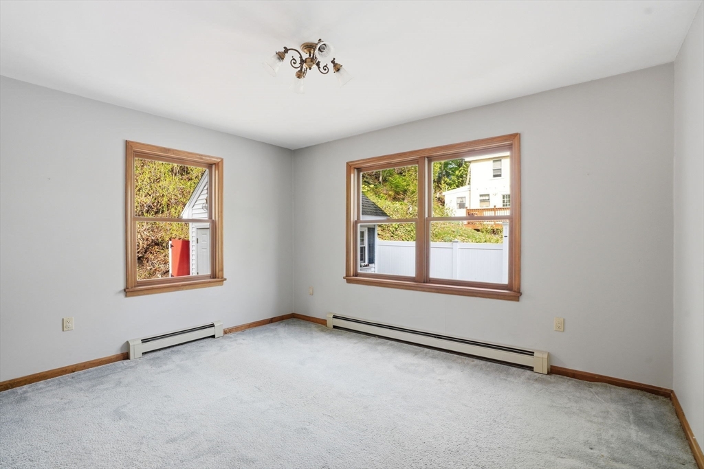 67 Wituwamat Road Weymouth, MA 02191 - Photo 16 of 42 an empty room with windows