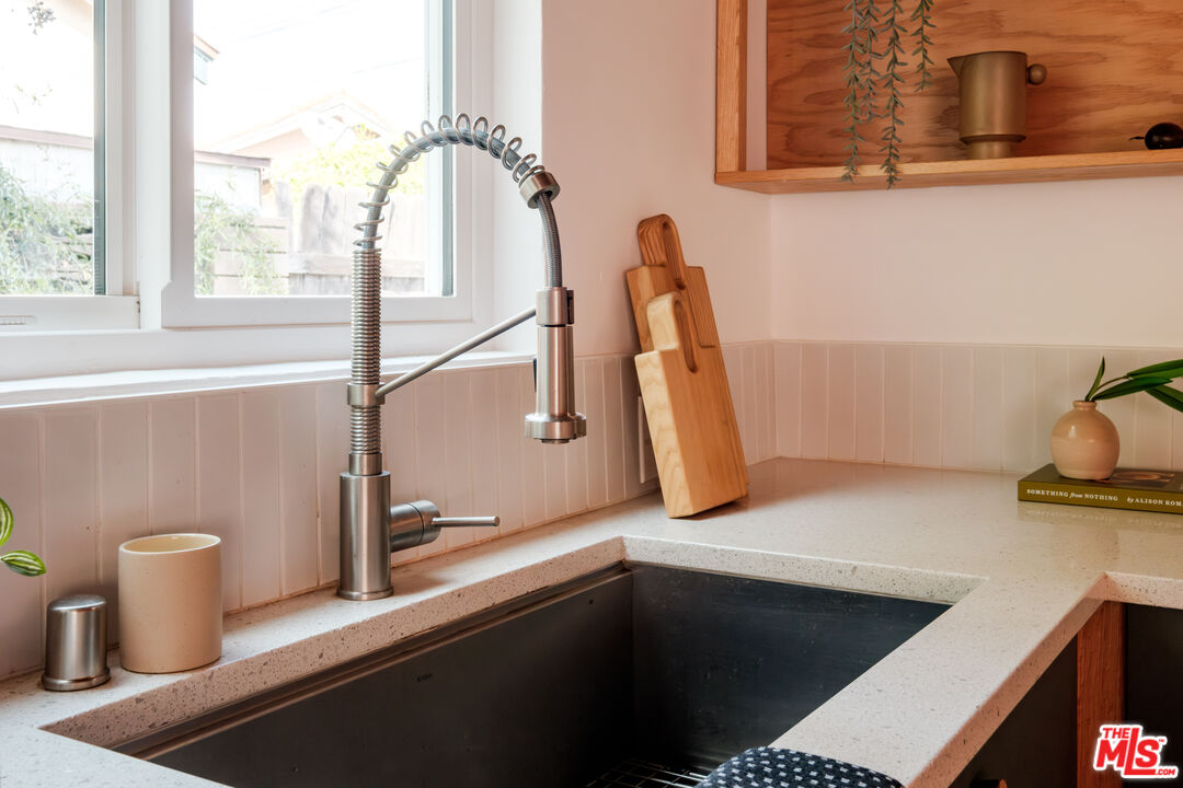940 East Arroyo Terrace Alhambra, CA 91801 - Photo 17 of 54 a kitchen with a sink and a window