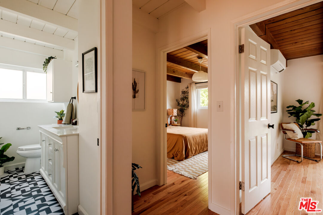 940 East Arroyo Terrace Alhambra, CA 91801 - Photo 20 of 54 a view of a hallway and a livingroom and a dining room with furniture
