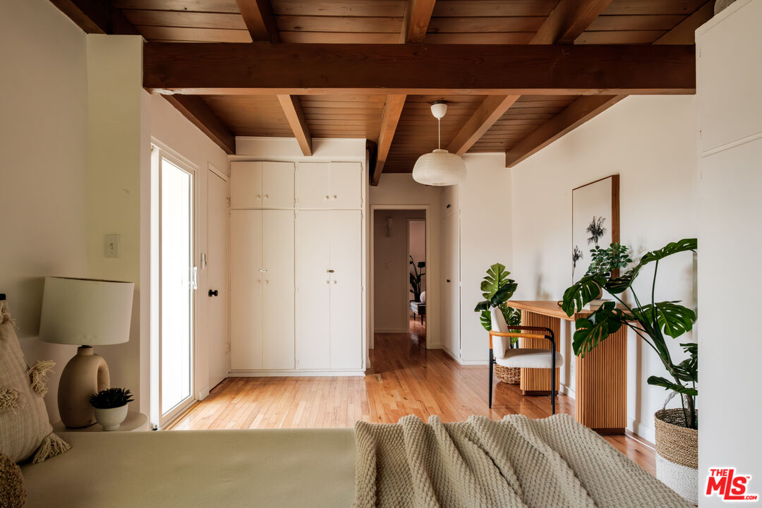 940 East Arroyo Terrace Alhambra, CA 91801 - Photo 38 of 54 a bedroom with furniture and a potted plant