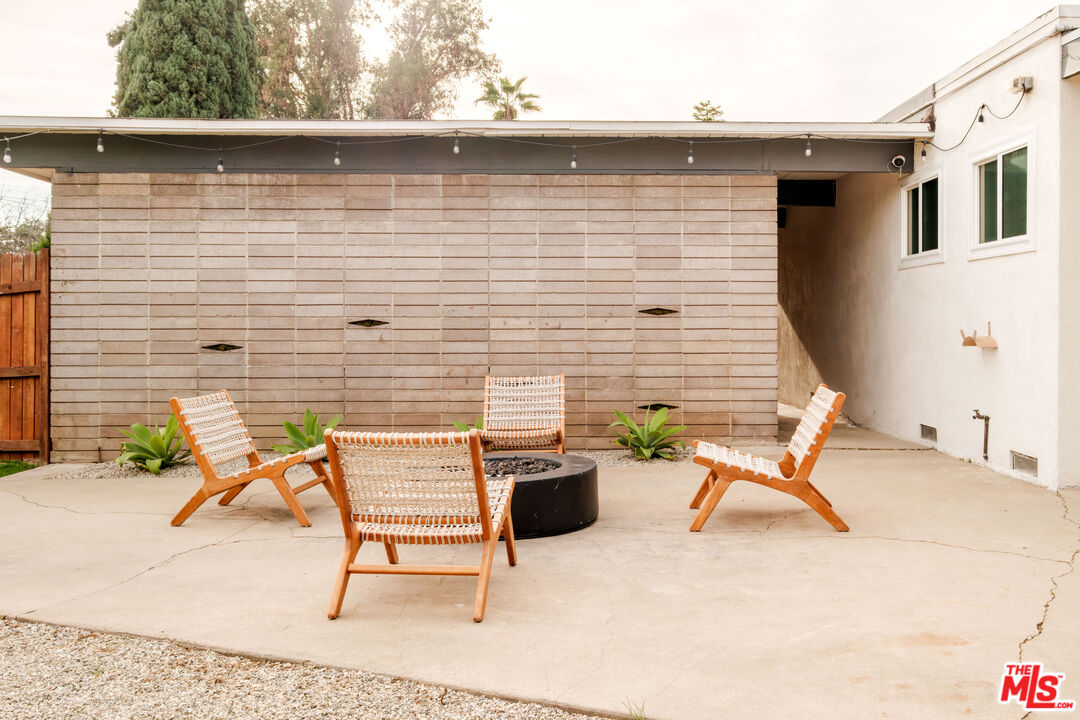 940 East Arroyo Terrace Alhambra, CA 91801 - Photo 45 of 54 a brick house with table and chairs