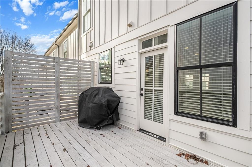 5862 Westin Road Atlanta, GA 30328 - Photo 16 of 43 a view of a two chairs and a tables in the balcony