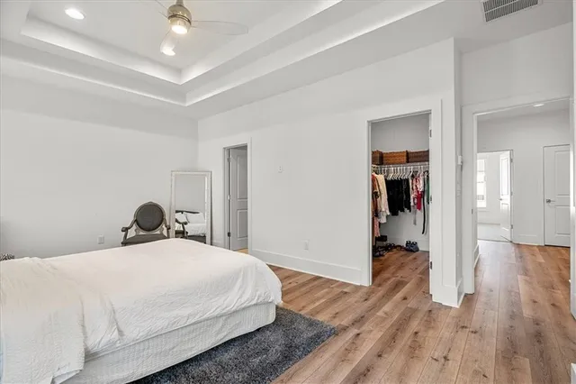 a bedroom with a bed and a view of bathroom