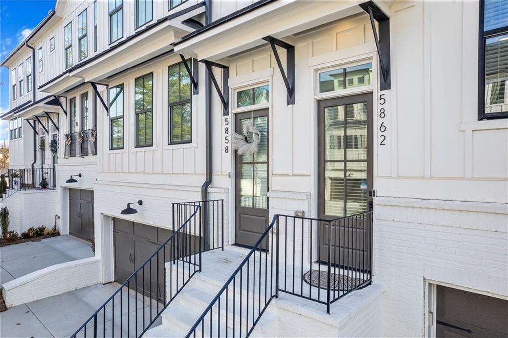 5862 Westin Road Atlanta, GA 30328 - Photo 2 of 43 a view of a balcony with wooden floor and furniture