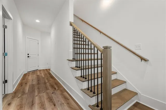 a room with a bed and a window