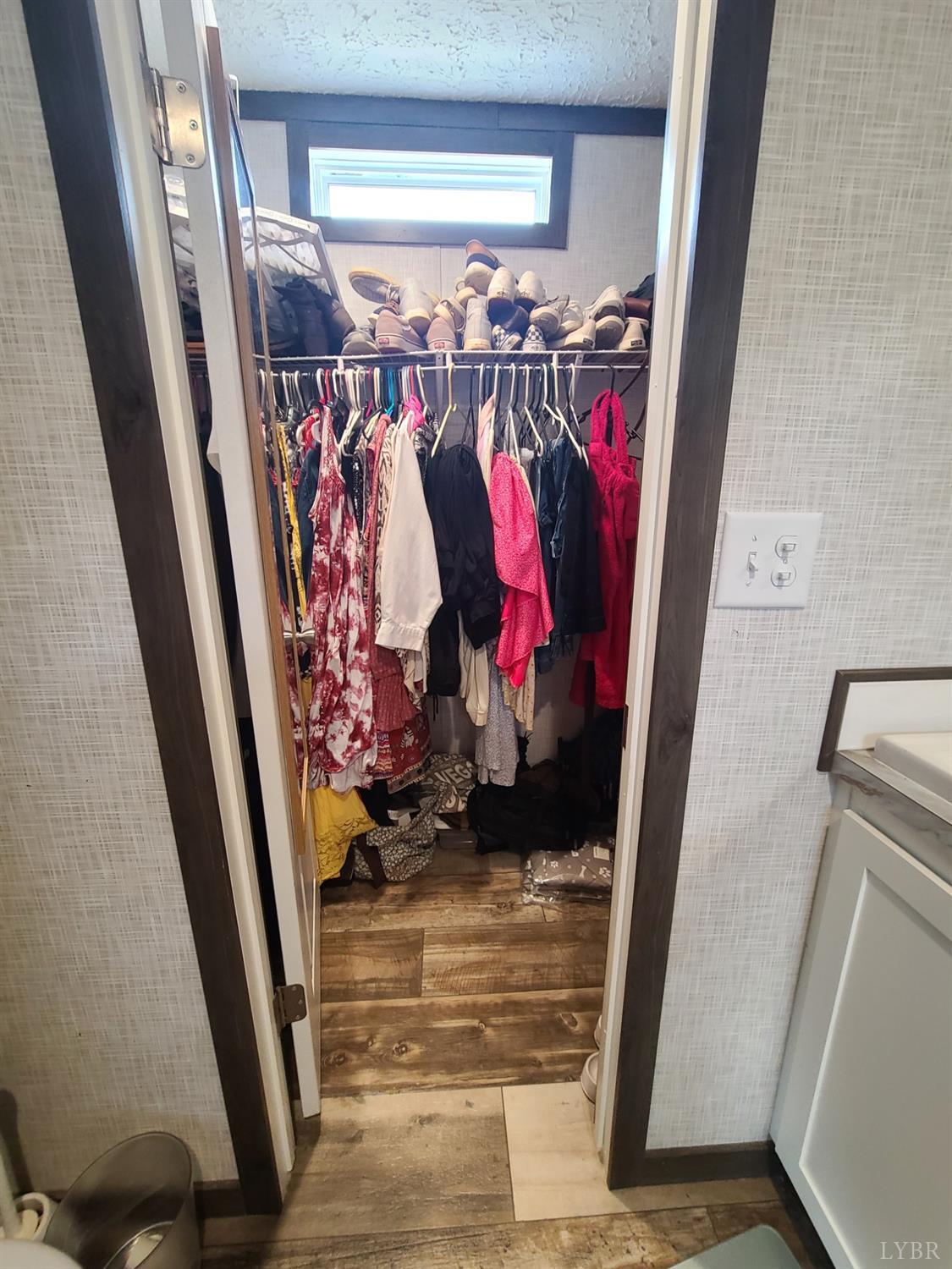 344 Midway Road Phenix, VA 23959 - Photo 16 of 37 a view of walk in closet with clothes