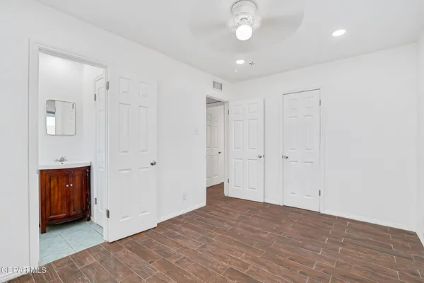 a view of a livingroom with wooden floor