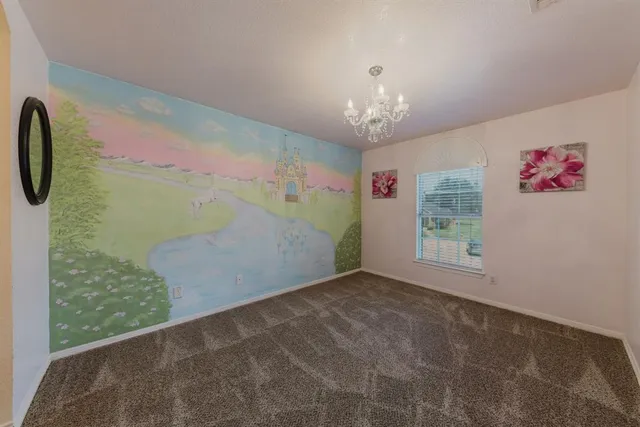 a bathroom with a granite countertop sink a mirror and a shower