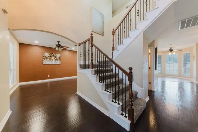 a view of a kitchen with a stove cabinets and a window