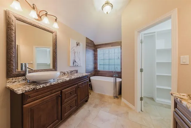 a terrace with outdoor seating and wooden floor