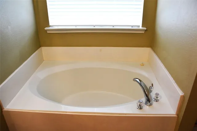 a bathroom with a bathtub