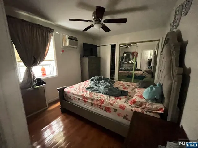 a bathroom with a sink mirror and a bathtub