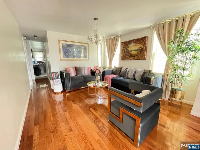 a kitchen with a sink stainless steel appliances and cabinets