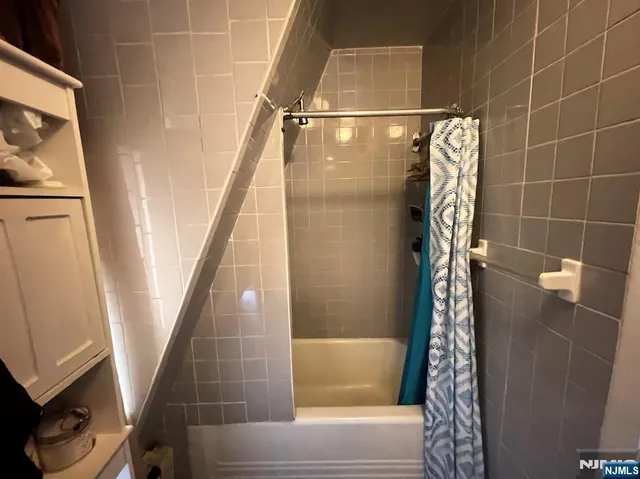 a bathroom with a toilet and a sink