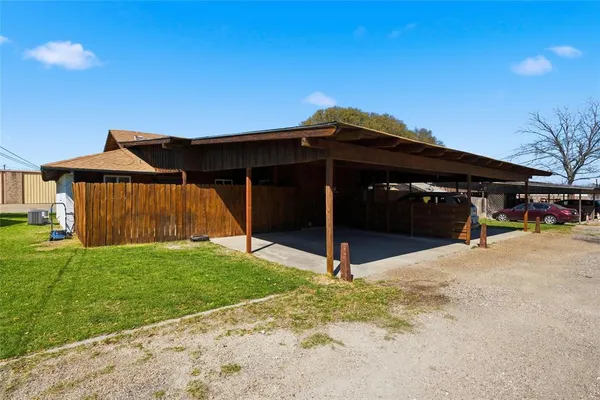 a view of house with yard