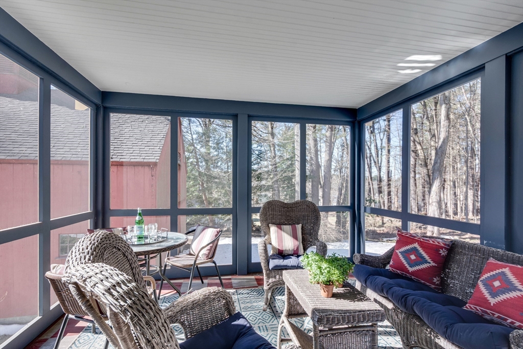 32 Pope Road Acton, MA 01720 - Photo 22 of 38 a living room with furniture and floor to ceiling windows