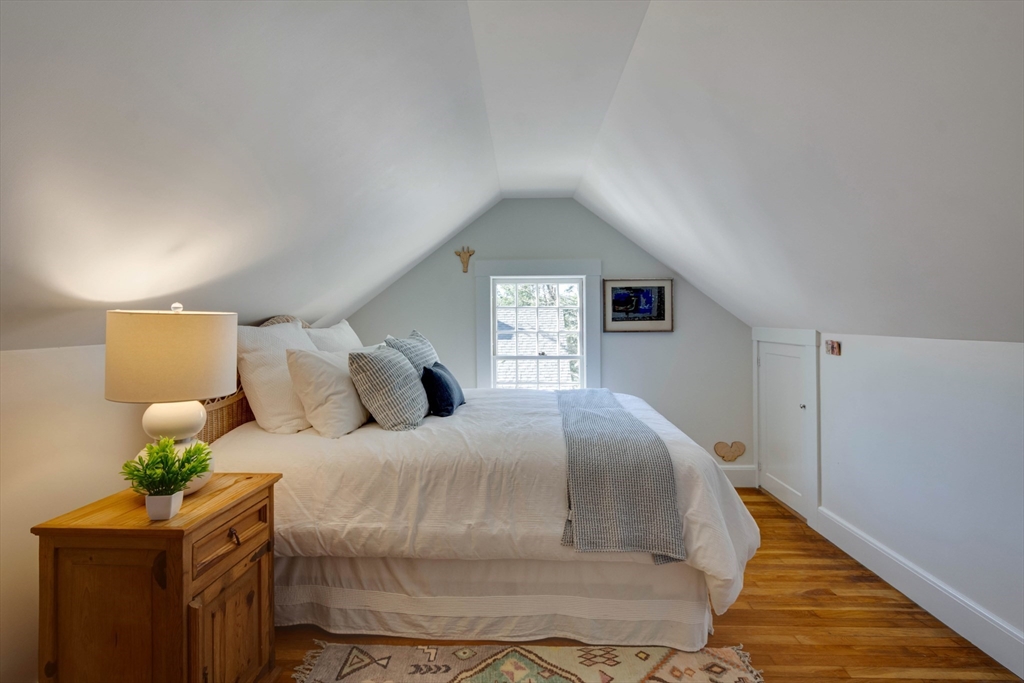 32 Pope Road Acton, MA 01720 - Photo 26 of 38 a bedroom with a bed and window