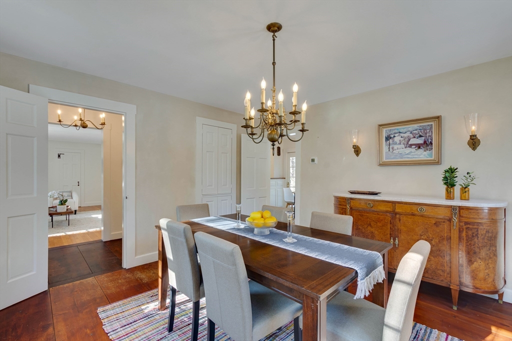 32 Pope Road Acton, MA 01720 - Photo 3 of 38 a view of a dining room with furniture wooden floor and a chandelier