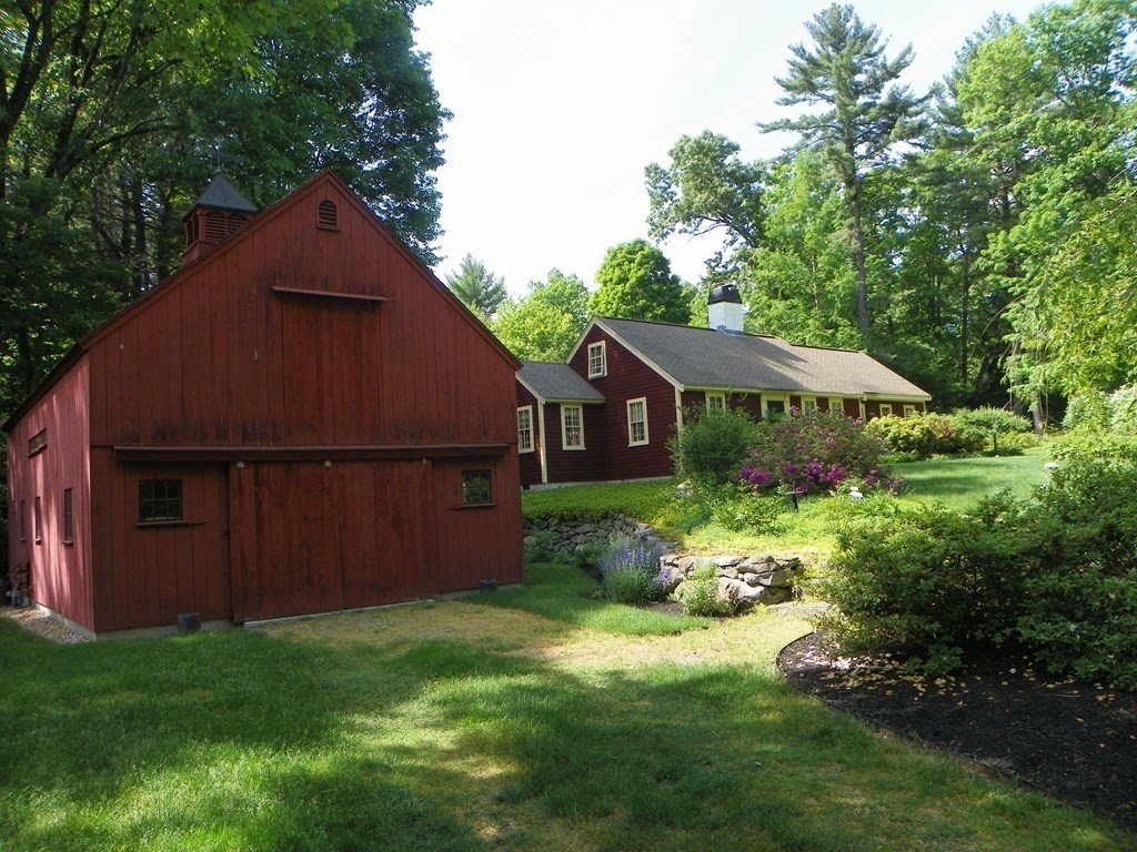 32 Pope Road Acton, MA 01720 - Photo 35 of 38 a front view of a house with garden