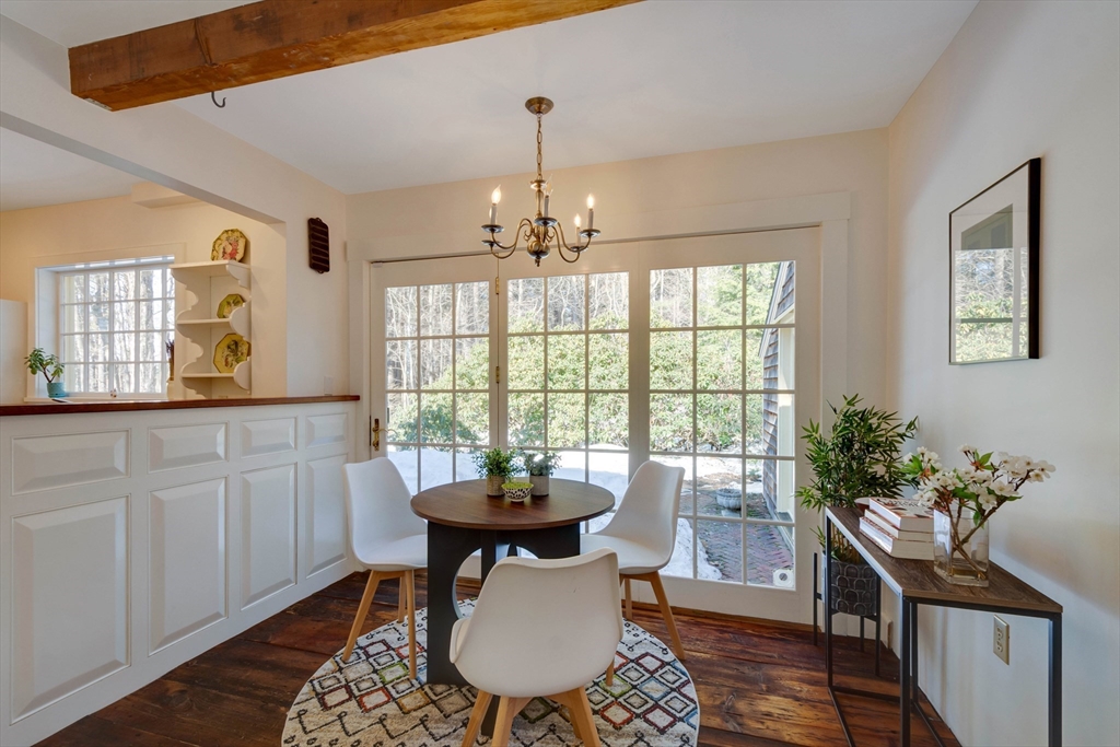 32 Pope Road Acton, MA 01720 - Photo 4 of 38 a view of a dining room with furniture window and wooden floor