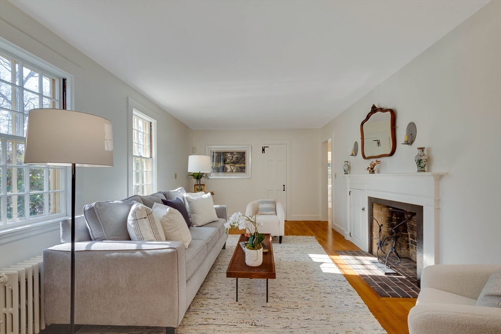 32 Pope Road Acton, MA 01720 - Photo 7 of 38 a living room with furniture and a fireplace