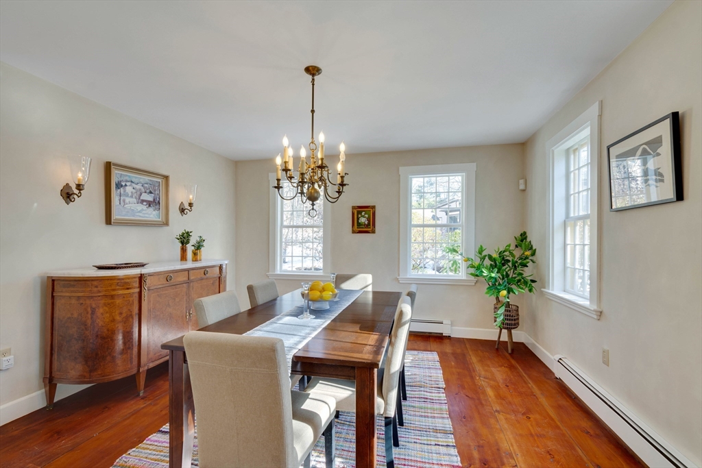 32 Pope Road Acton, MA 01720 - Photo 8 of 38 a view of a dining room with furniture window and wooden floor