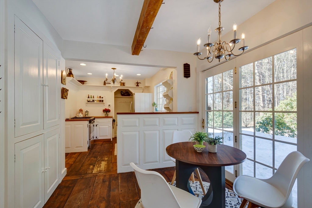 32 Pope Road Acton, MA 01720 - Photo 10 of 38 a view of a dining room with furniture window and wooden floor