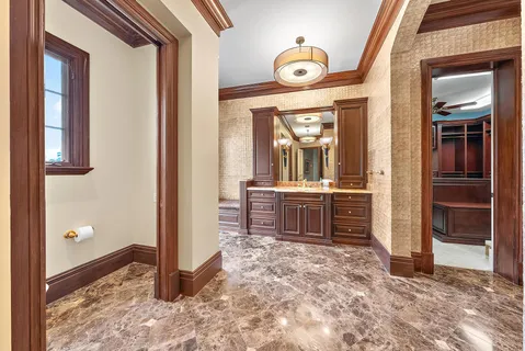 a room with furniture and a ceiling fan