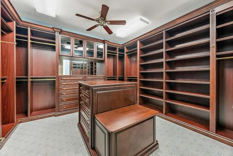 a view of a livingroom with furniture and a window