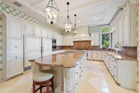 a dining room with furniture a rug and wooden floor