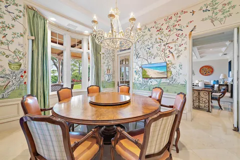 a view of a room with furniture and window