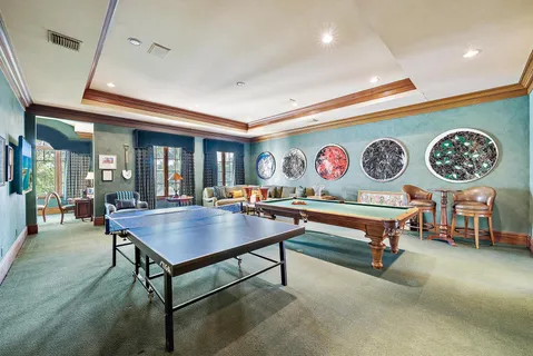 a bathroom with a granite countertop sink mirror and double