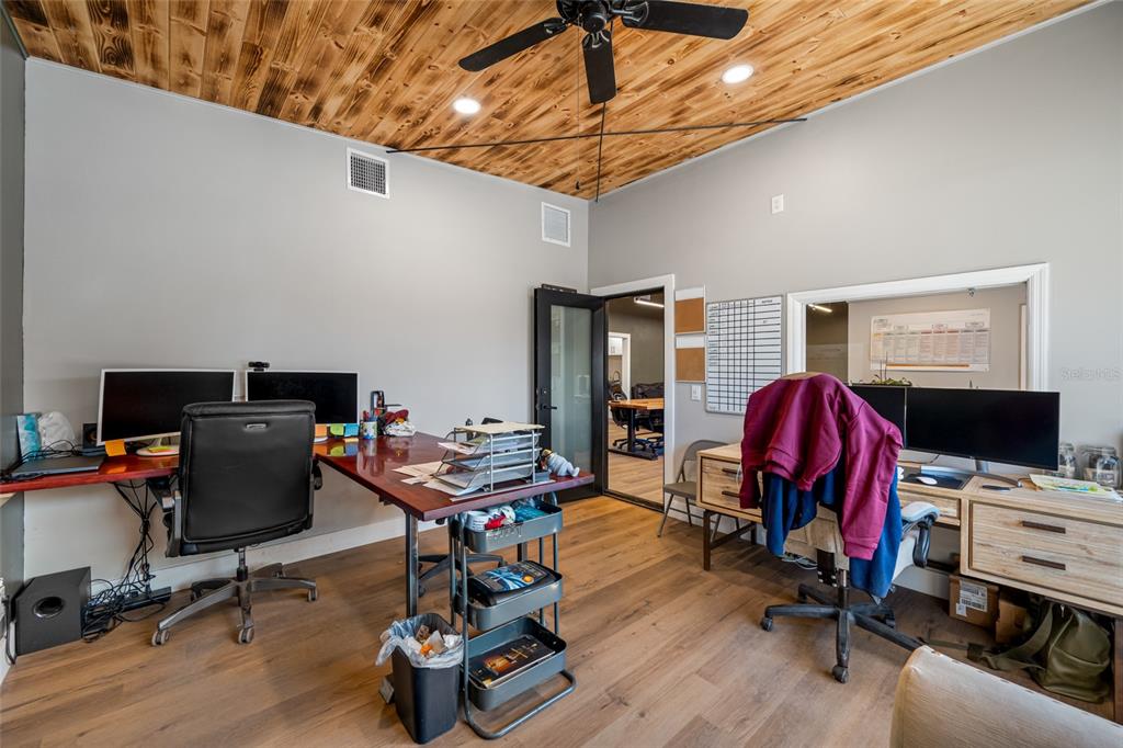 620 Union Street Dunedin, FL 34698 - Photo 15 of 45 a view of a workspace with furniture and a window