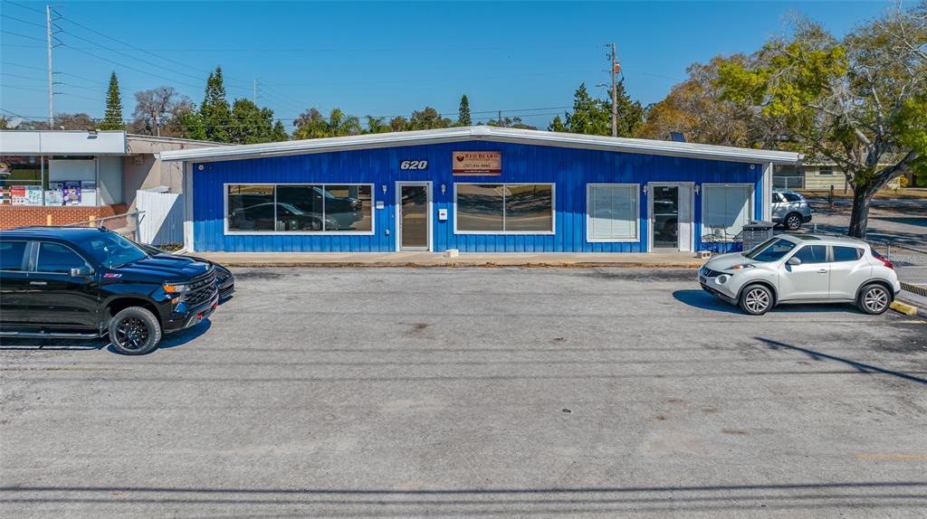 620 Union Street Dunedin, FL 34698 - Photo 2 of 45 a car parked in front of a building