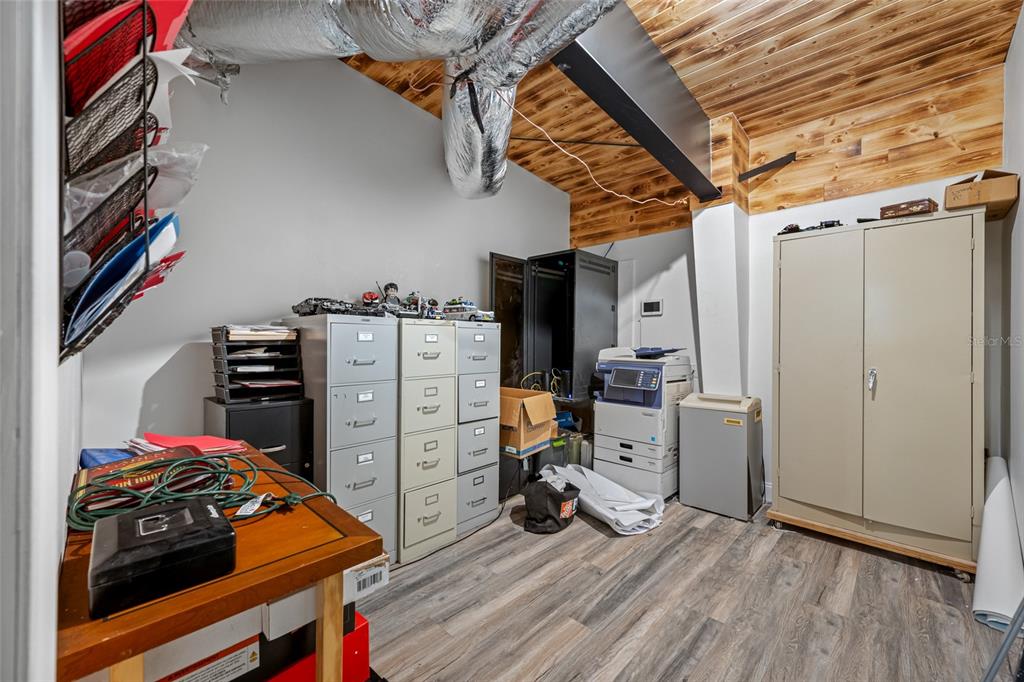 620 Union Street Dunedin, FL 34698 - Photo 22 of 45 a view of a storage & utility room with stuff