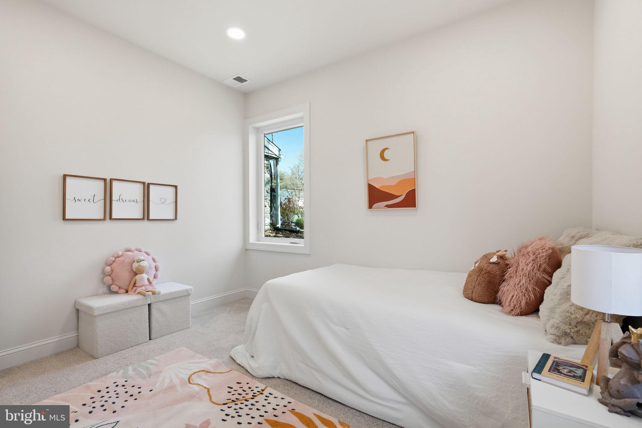 409 South Providence Road Wallingford, PA 19086 - Photo 51 of 106 Serene bedroom with soft pastel tones.