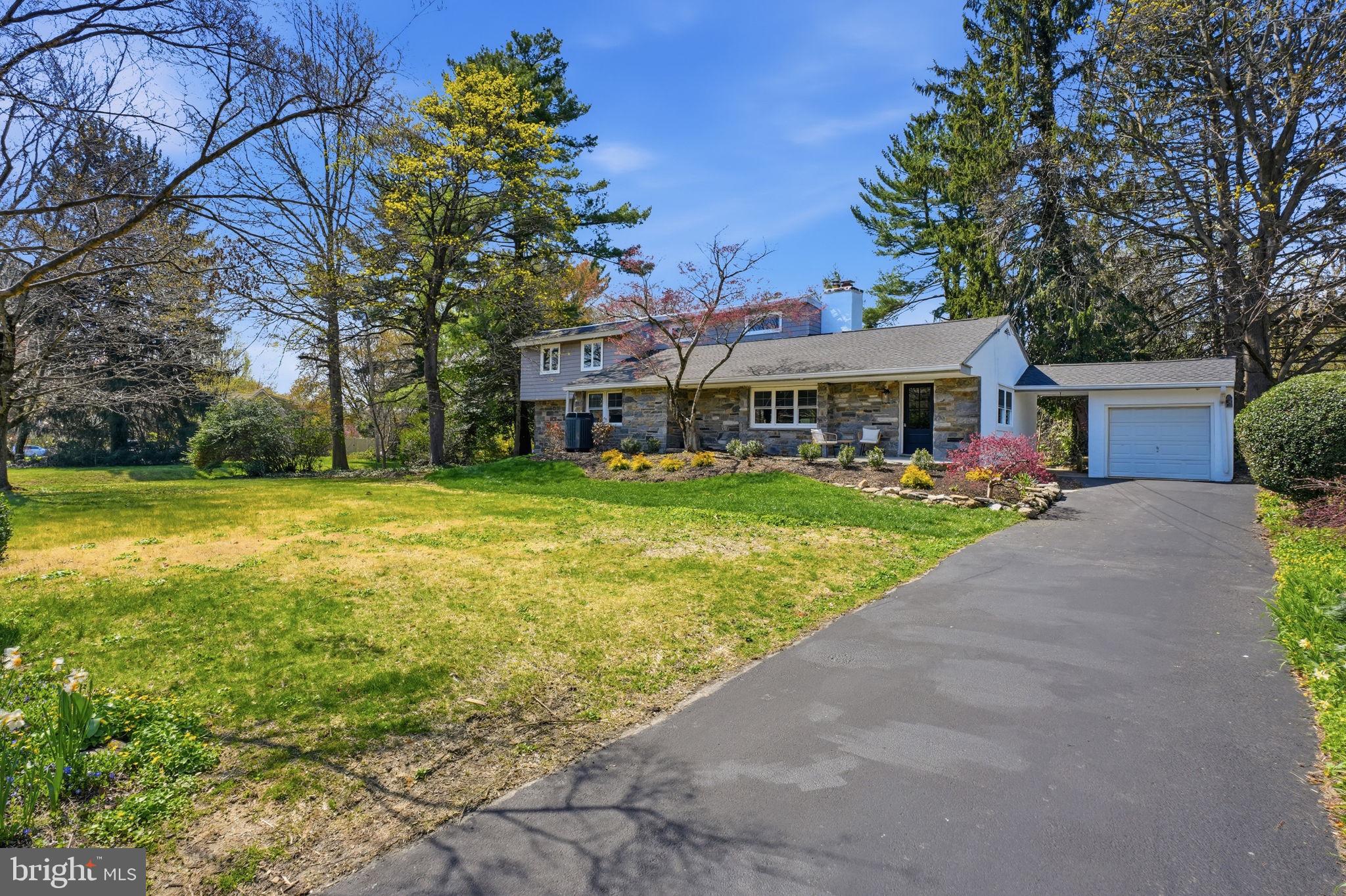 409 South Providence Road Wallingford, PA 19086 - Photo 6 of 106 Charming home amid lush greenery.